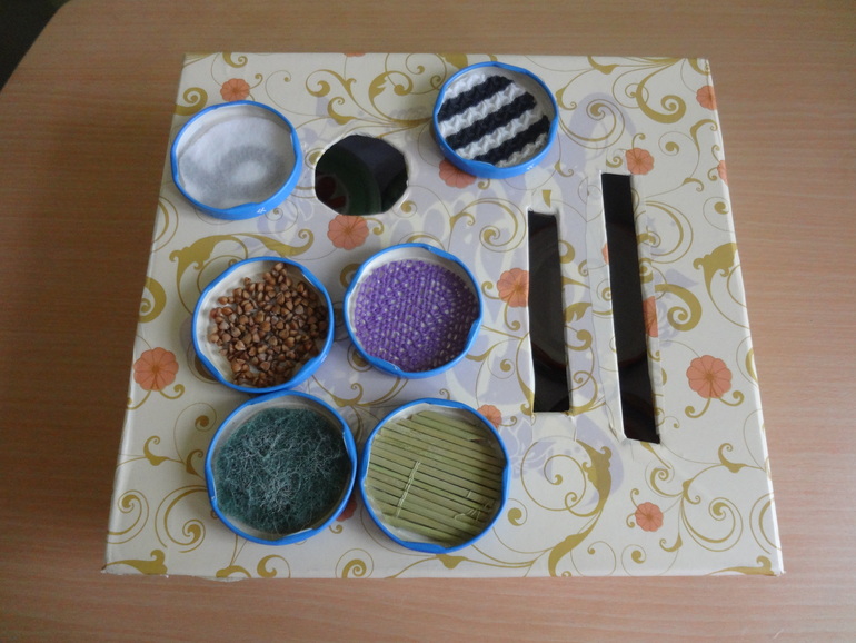 Трогательная игра с коробочкой -сортером