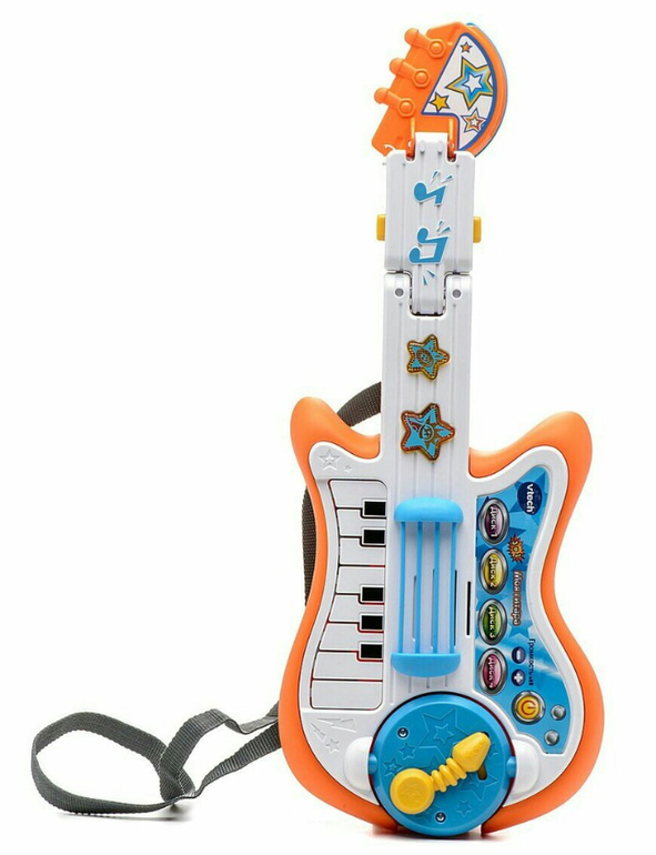 Купить гитару мальчику. Музыкальная гитара Vtech. Игрушечная гитара. Музыкальная игрушка для малышей. Игрушка музыкальная гитара.