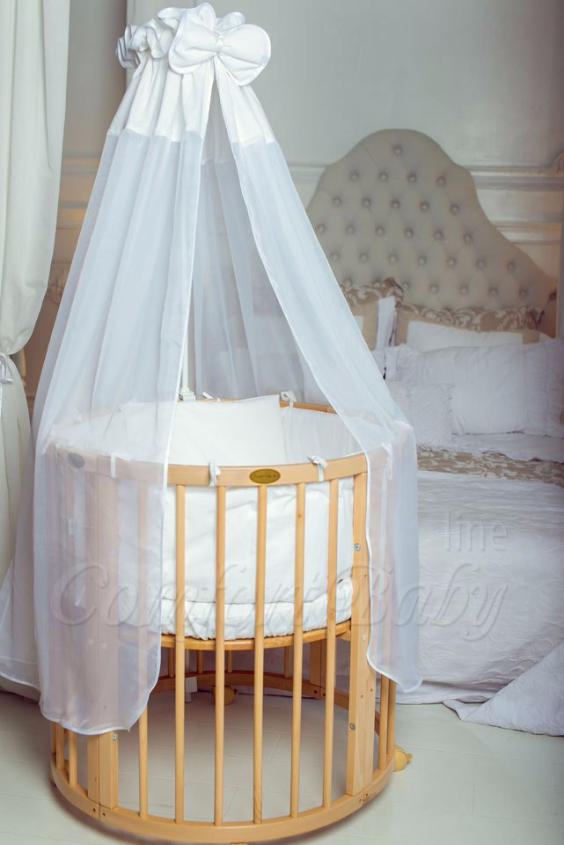 КРОВАТКА- ТРАНСФОРМЕР "COMFORT BABY" .Цена: 25 000 руб.  ХАРАКТЕРИСТИКИ:  возраст детей: 0-5 лет  габариты модели (Д х Ш х В): 1) колыбельки: 78*76*81 см  2) овальной кроватки: 128*76*81 cм  матрас приобретается отдельно.  максимальная нагрузка: 120 кг  Материал: изготавливается только из настоящего массива бука высшего сорта.  сборка: кровать в разобранном виде, простота сборки, инструкция по сборке на русском языке  продукция сертифицирована  производство: Россия  гарантия: 2 года   Дополнительные характеристики: 4 положения по высоте (расстояние положения дна от пола без колес: 1см, 12см, 37см, 57см; расстояние между отверстиями снизу-наверх: 12см, 15см, 20см.); 3 прутика - съемные.  КОНМПЛЕКТАЦИЯ:  1-я ступень - круглая кроватка  2-я ступень - овальная кроватка  3-я ступень - диванчик  4-я ступень - манеж  5-я и 6-я ступени - 2 кресла и столик  7-я ступень - пеленальный столик  ДОПОЛНИТЕЛЬНЫЕ ОПЦИИ:  Комплект постельный "Classic" +6950 руб.  Комплект постельный "Colorit" + 11990 руб.  Фирменный держатель для балдахина +790 руб.  Комплект цельных матрасов " Холкон"/ "Кокос" (круглый+овальный) +8490 руб  Маятник "ComfortBaby Pendulum" 2 в 1+6990 руб.