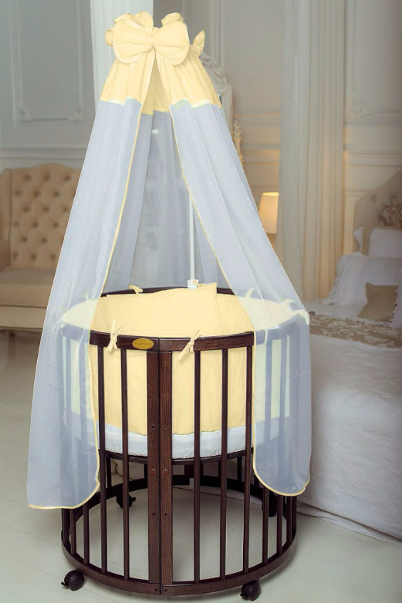 КРОВАТКА- ТРАНСФОРМЕР "COMFORT BABY" .Цена: 25 000 руб.  ХАРАКТЕРИСТИКИ:  возраст детей: 0-5 лет  габариты модели (Д х Ш х В): 1) колыбельки: 78*76*81 см  2) овальной кроватки: 128*76*81 cм  матрас приобретается отдельно.  максимальная нагрузка: 120 кг  Материал: изготавливается только из настоящего массива бука высшего сорта.  сборка: кровать в разобранном виде, простота сборки, инструкция по сборке на русском языке  продукция сертифицирована  производство: Россия  гарантия: 2 года   Дополнительные характеристики: 4 положения по высоте (расстояние положения дна от пола без колес: 1см, 12см, 37см, 57см; расстояние между отверстиями снизу-наверх: 12см, 15см, 20см.); 3 прутика - съемные.  КОНМПЛЕКТАЦИЯ:  1-я ступень - круглая кроватка  2-я ступень - овальная кроватка  3-я ступень - диванчик  4-я ступень - манеж  5-я и 6-я ступени - 2 кресла и столик  7-я ступень - пеленальный столик  ДОПОЛНИТЕЛЬНЫЕ ОПЦИИ:  Комплект постельный "Classic" +6950 руб.  Комплект постельный "Colorit" + 11990 руб.  Фирменный держатель для балдахина +790 руб.  Комплект цельных матрасов " Холкон"/ "Кокос" (круглый+овальный) +8490 руб  Маятник "ComfortBaby Pendulum" 2 в 1+6990 руб.